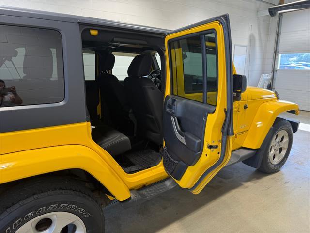 used 2015 Jeep Wrangler Unlimited car, priced at $20,821