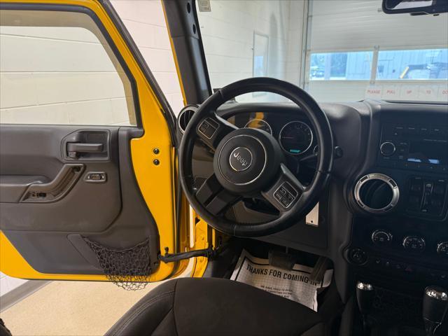 used 2015 Jeep Wrangler Unlimited car, priced at $20,821