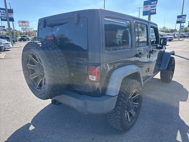 used 2015 Jeep Wrangler Unlimited car, priced at $18,888