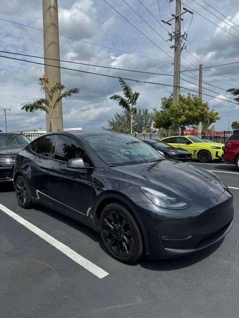 used 2024 Tesla Model Y car, priced at $40,000