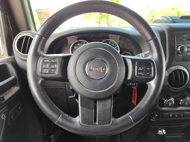 used 2015 Jeep Wrangler Unlimited car, priced at $13,487