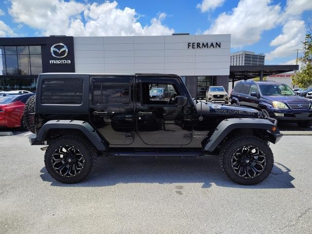 used 2015 Jeep Wrangler Unlimited car, priced at $13,487