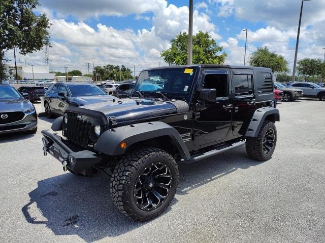 used 2015 Jeep Wrangler Unlimited car, priced at $13,487