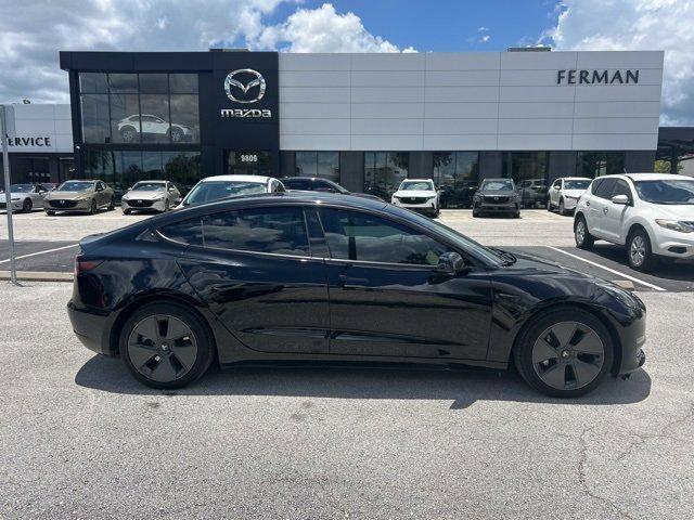 used 2023 Tesla Model 3 car, priced at $25,000