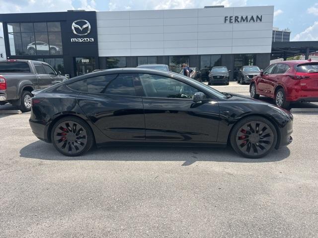 used 2022 Tesla Model 3 car, priced at $27,987