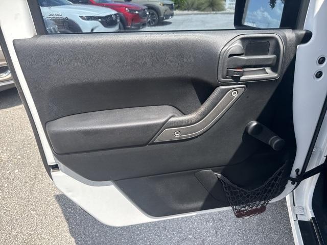 used 2015 Jeep Wrangler Unlimited car, priced at $16,988