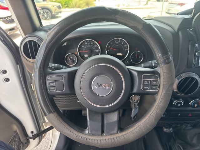used 2015 Jeep Wrangler Unlimited car, priced at $16,988