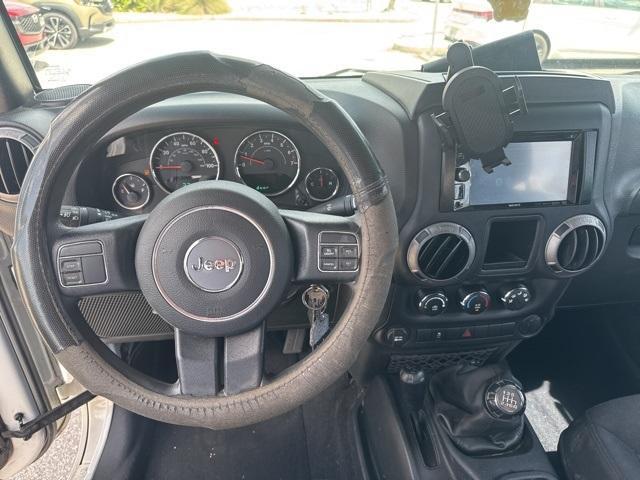 used 2015 Jeep Wrangler Unlimited car, priced at $16,988