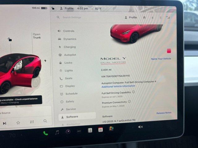 used 2025 Tesla Model Y car, priced at $43,987