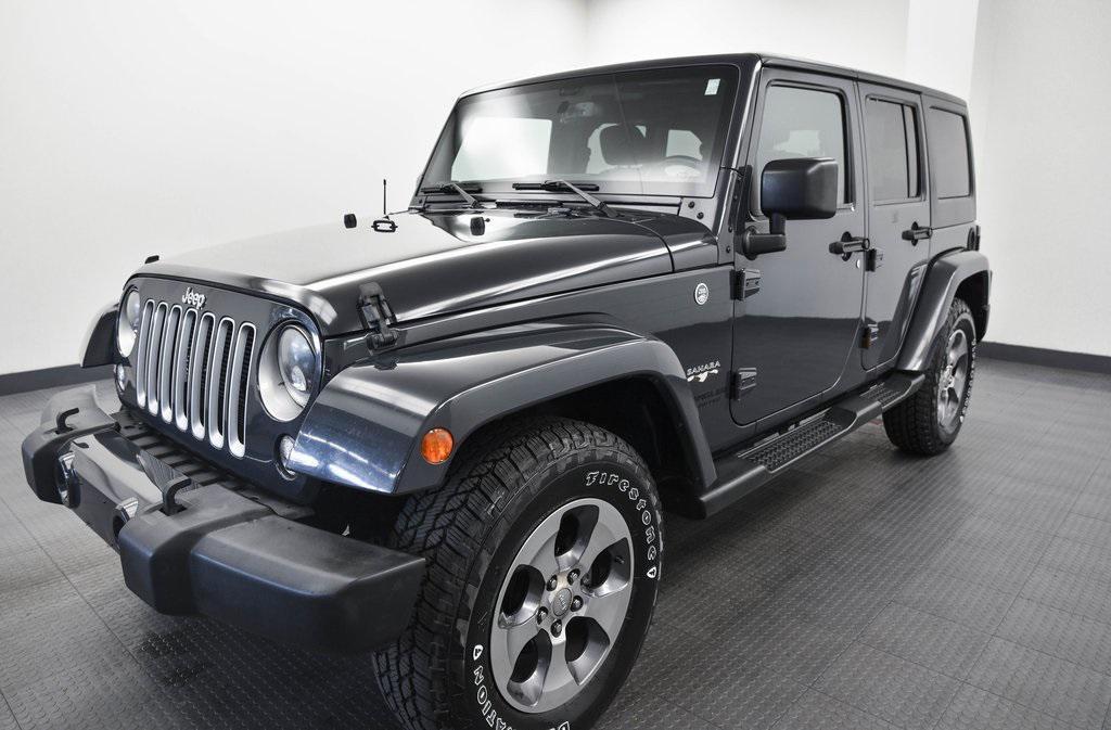 used 2016 Jeep Wrangler Unlimited car, priced at $15,990