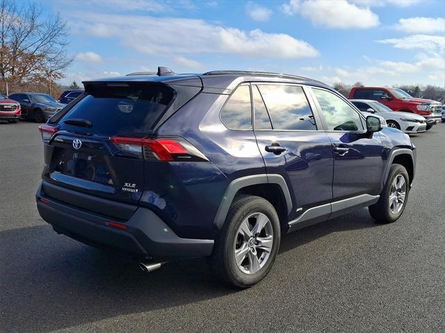 used 2022 Toyota RAV4 Hybrid car, priced at $30,000