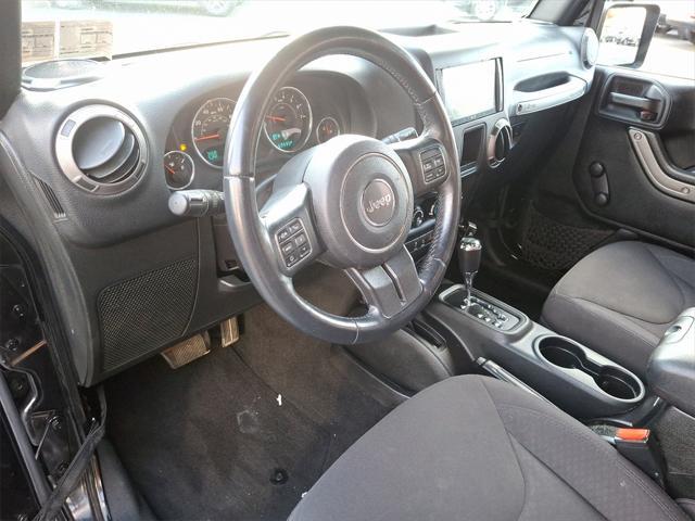 used 2015 Jeep Wrangler car, priced at $21,000