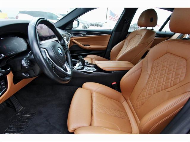 used 2023 BMW 530e car, priced at $33,561
