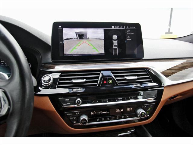 used 2023 BMW 530e car, priced at $33,561
