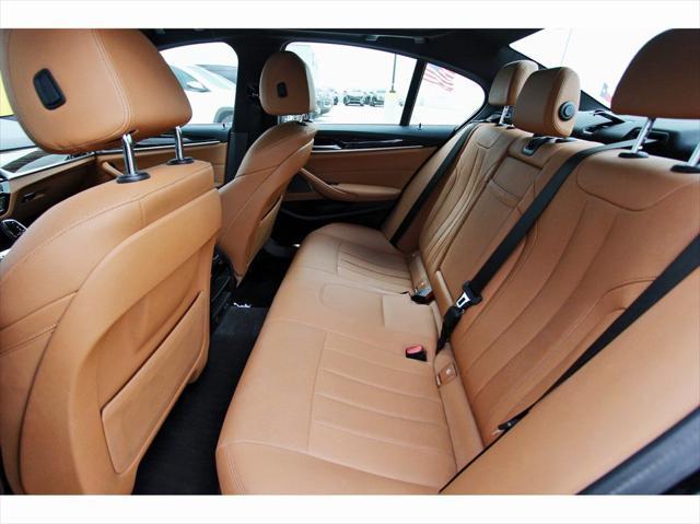used 2023 BMW 530e car, priced at $33,561