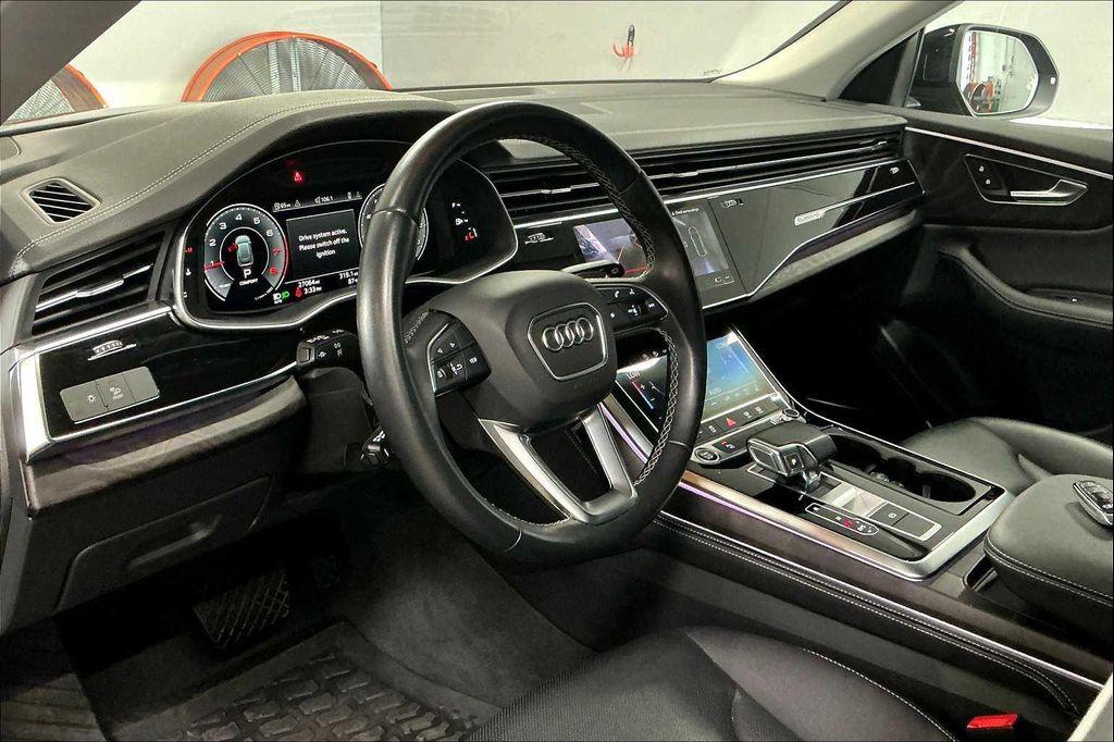 used 2023 Audi Q8 car, priced at $55,879