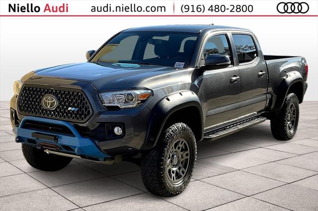 used 2019 Toyota Tacoma car, priced at $33,118