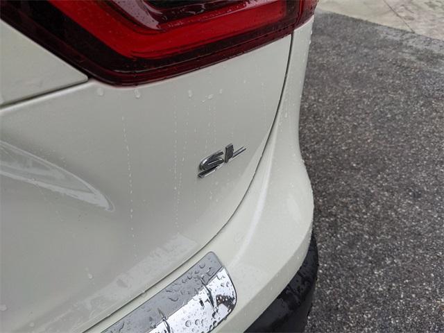 used 2022 Nissan Rogue Sport car, priced at $19,477