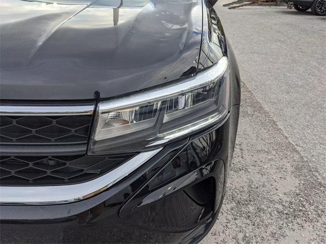 used 2023 Volkswagen Taos car, priced at $18,577