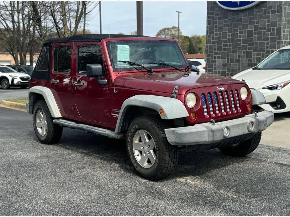 used 2012 Jeep Wrangler Unlimited car, priced at $16,796