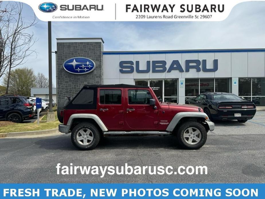 used 2012 Jeep Wrangler Unlimited car, priced at $16,596