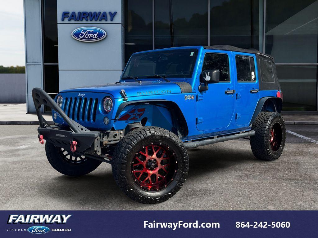 used 2015 Jeep Wrangler Unlimited car, priced at $20,997