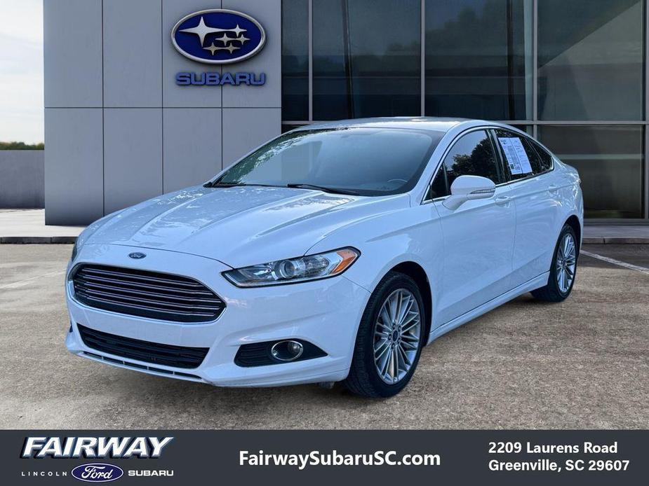 used 2014 Ford Fusion car, priced at $7,996