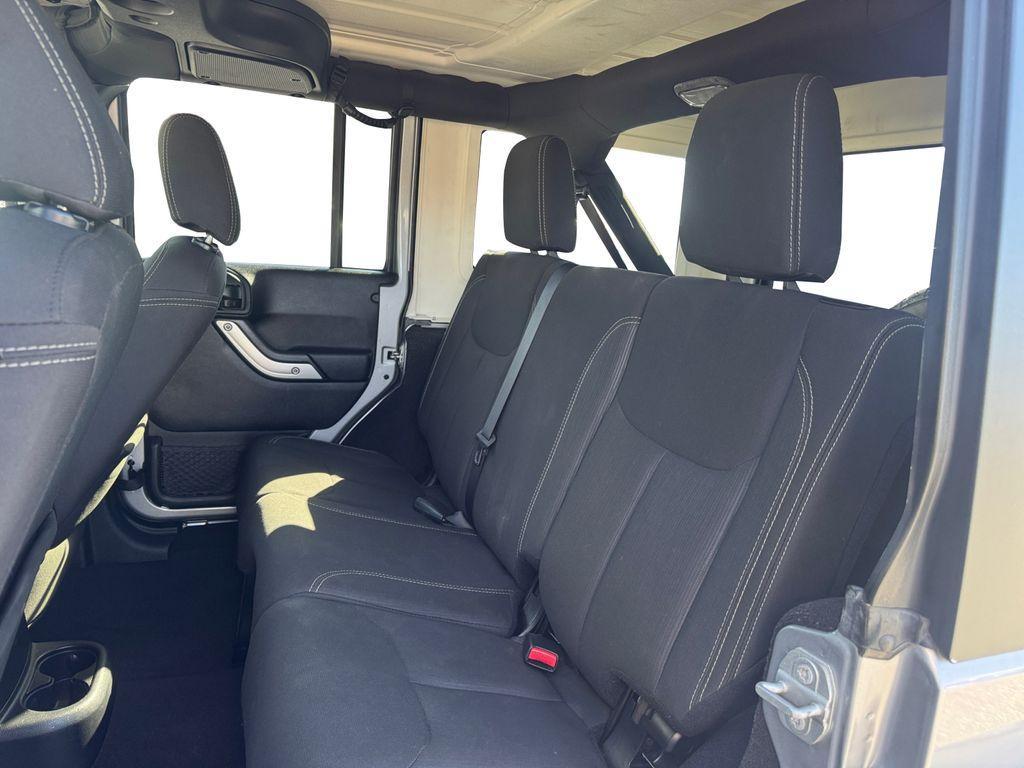 used 2018 Jeep Wrangler JK Unlimited car, priced at $20,897