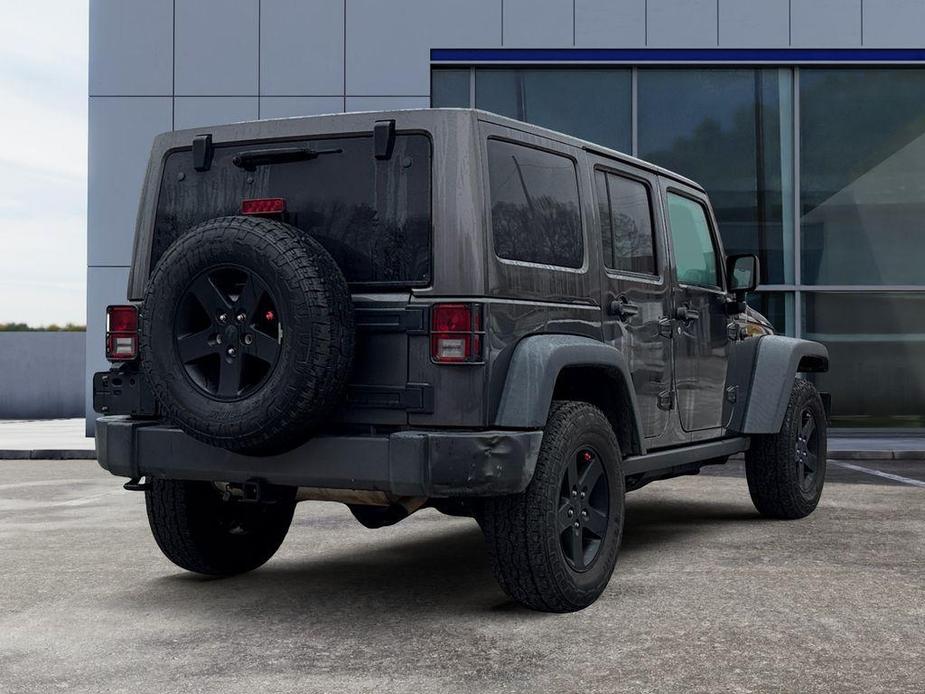 used 2017 Jeep Wrangler Unlimited car, priced at $16,896