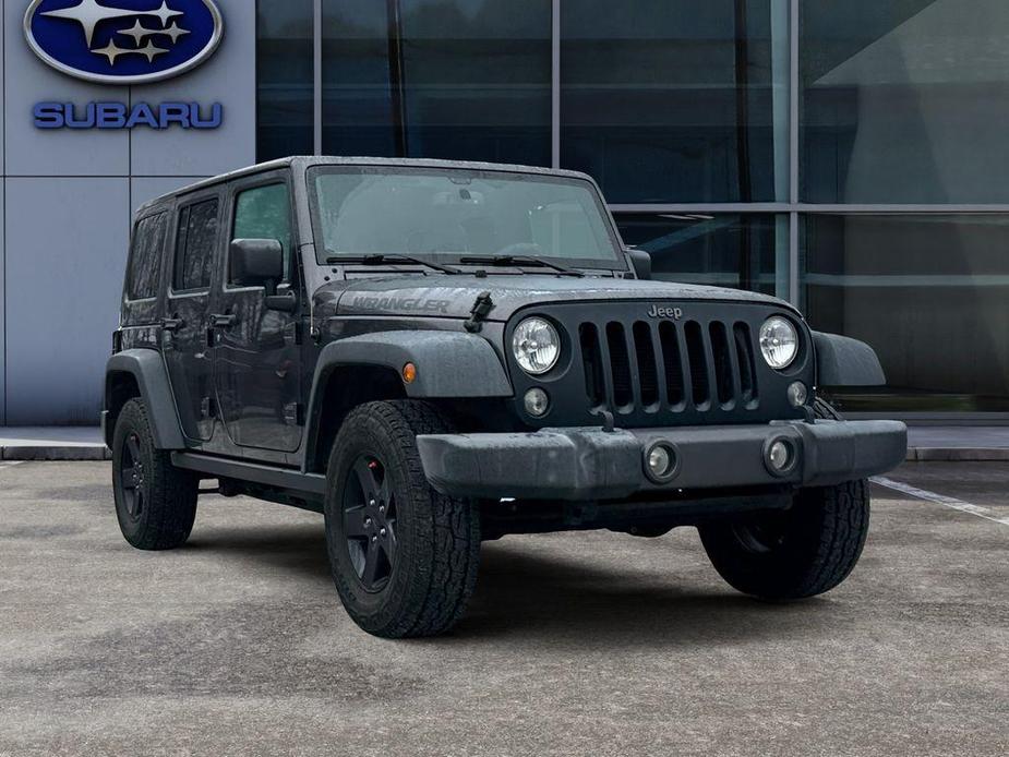 used 2017 Jeep Wrangler Unlimited car, priced at $16,896