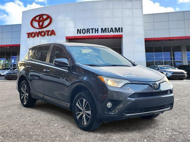 used 2018 Toyota RAV4 car, priced at $19,162