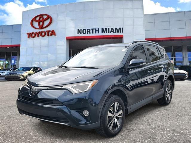 used 2018 Toyota RAV4 car, priced at $19,799