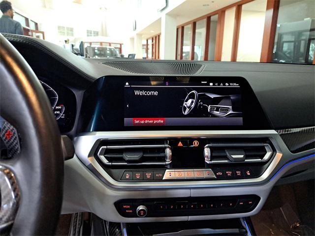 used 2022 BMW M4 car, priced at $63,728