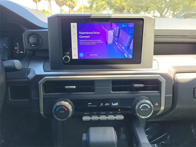 used 2025 Toyota Tacoma car, priced at $34,197