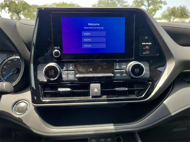 used 2023 Toyota Highlander Hybrid car, priced at $34,593