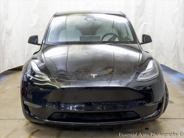 used 2023 Tesla Model Y car, priced at $34,527