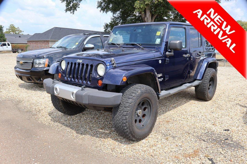 used 2013 Jeep Wrangler Unlimited car, priced at $16,471