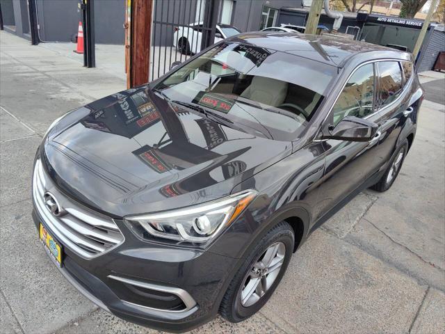 used 2018 Hyundai Santa Fe Sport car, priced at $13,995