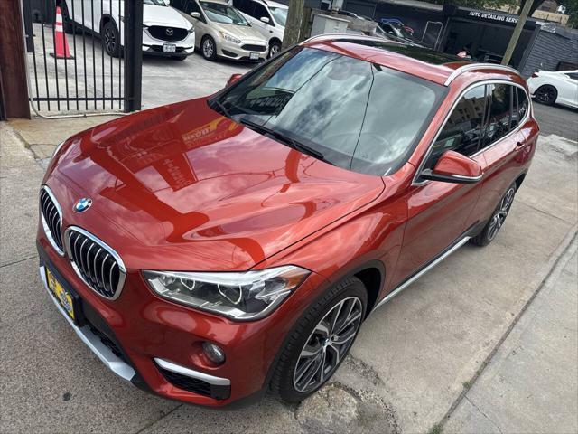 used 2018 BMW X1 car, priced at $17,995