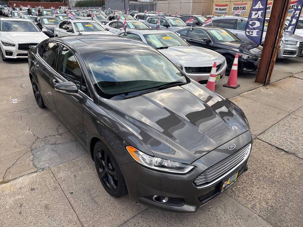 used 2016 Ford Fusion car, priced at $10,995
