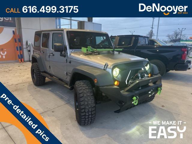 used 2014 Jeep Wrangler Unlimited car, priced at $17,250