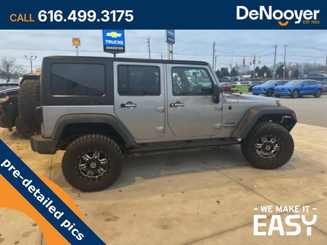 used 2014 Jeep Wrangler Unlimited car, priced at $17,250