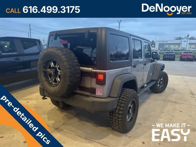 used 2014 Jeep Wrangler Unlimited car, priced at $17,250