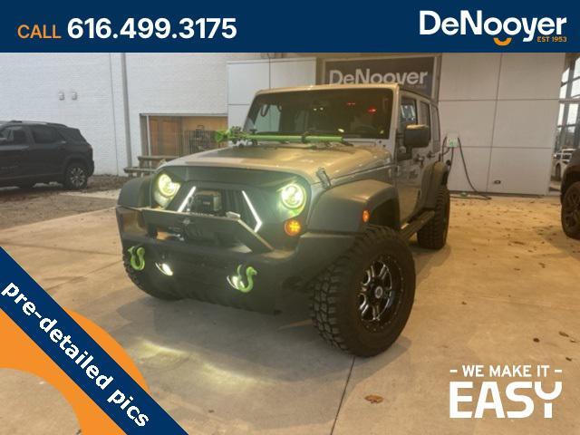 used 2014 Jeep Wrangler Unlimited car, priced at $17,250