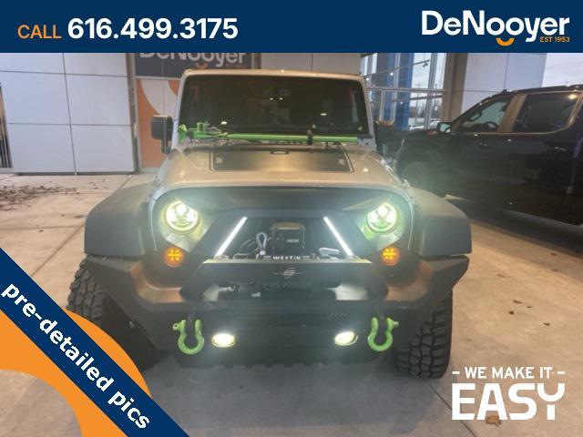 used 2014 Jeep Wrangler Unlimited car, priced at $17,250