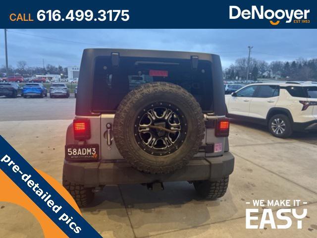 used 2014 Jeep Wrangler Unlimited car, priced at $17,250