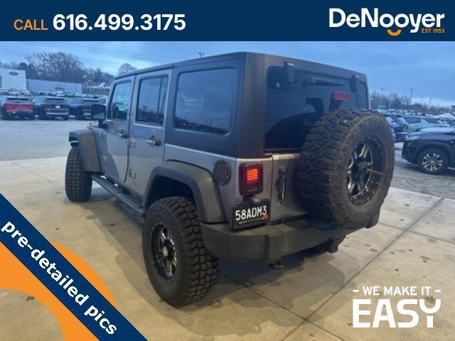 used 2014 Jeep Wrangler Unlimited car, priced at $17,250