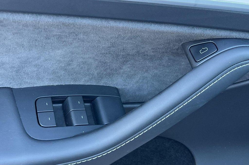used 2023 Tesla Model Y car, priced at $32,999
