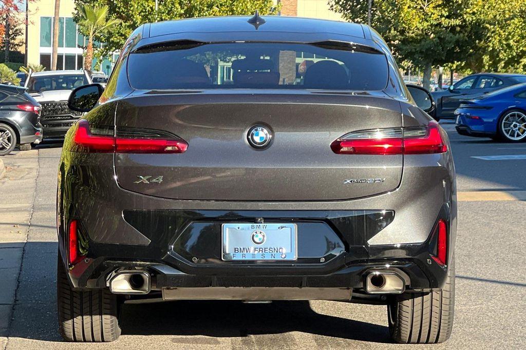 new 2025 BMW X4 car, priced at $64,370
