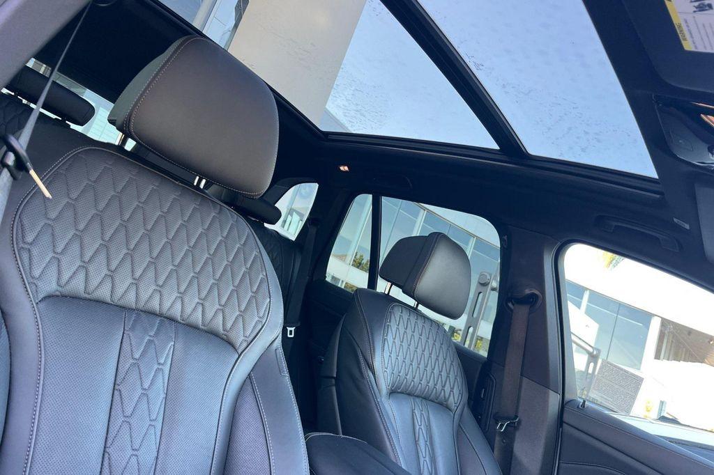 used 2025 BMW X5 PHEV car, priced at $59,899
